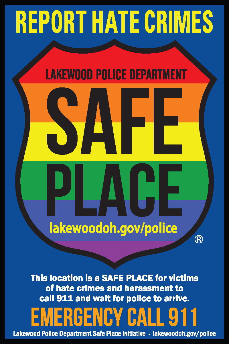 Image of the Safe Place sticker that businesses and organizations can place on their doors/windows. It reads "Report Hate Crimes", followed by a rainbow police badge with black text that reads "Lakewood Police Department Safe Place". Beneath the shield features text reading "This location is a safe place for victims of hate crimes and harassment to call 911 and wait for police to arrive. EMERGENCY CALL 911".